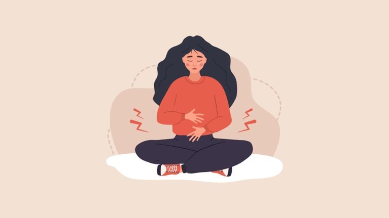 An illustration of a woman clutching her stomach with period cramps, for a story about the chaos of your period in your mid-30s.
