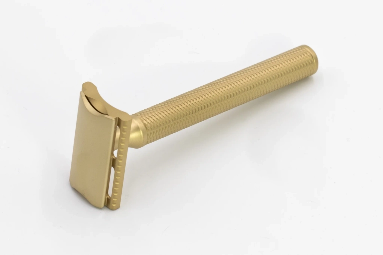 A brass safety razor from Edmonton brand Karve.