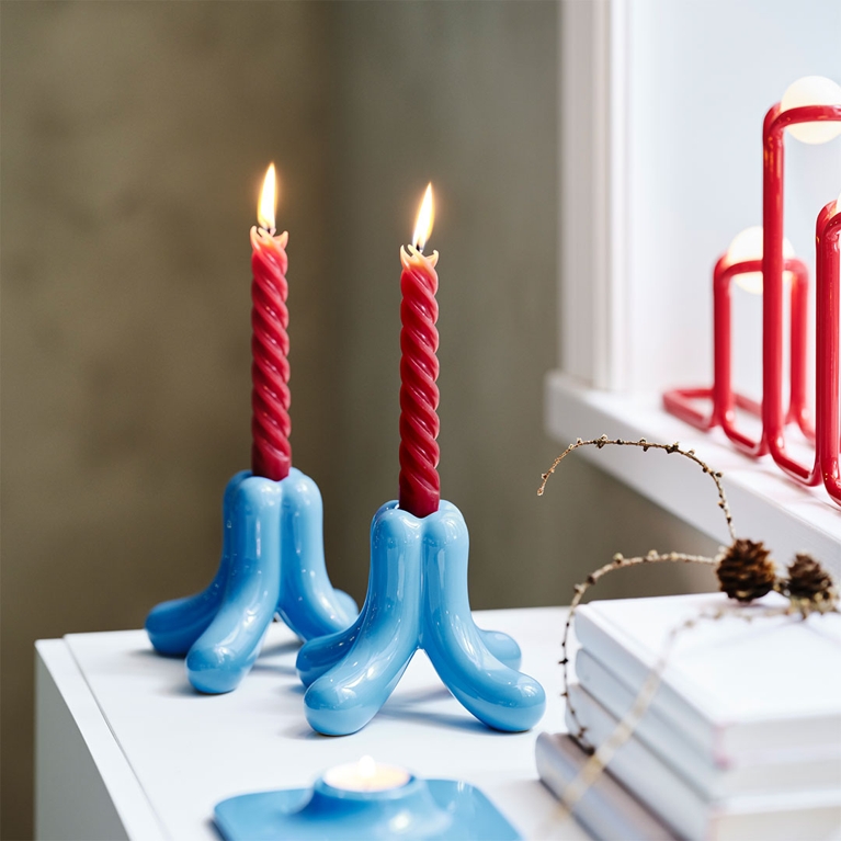 A set of tubular blue candle holders from the Gustaf Westman IKEA Christmas collection 2025 in Canada.