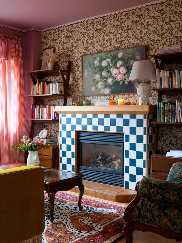 A maximalist living room makeover by Alexandra Gater with a tiled checkboard fireplace.