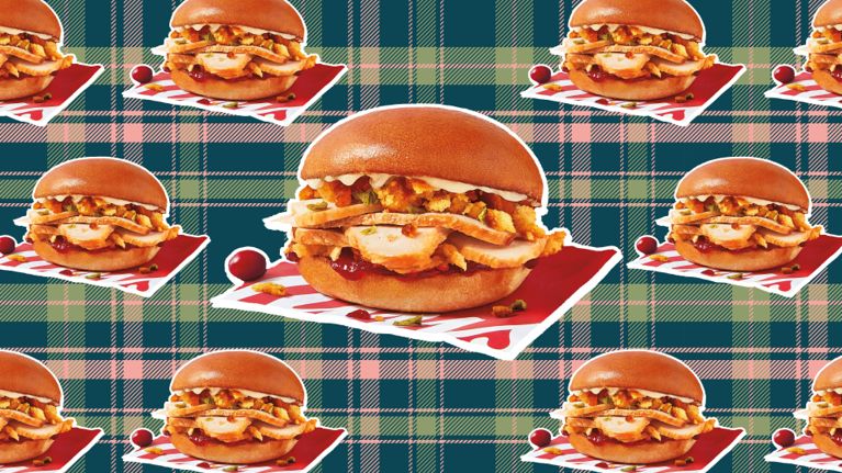 A repeating image of a sandwich filled with turkey, stuffing, mayo, cranberry sauce and crispy onions used in a post about Tim Hortons new thanksgiving sandwich.