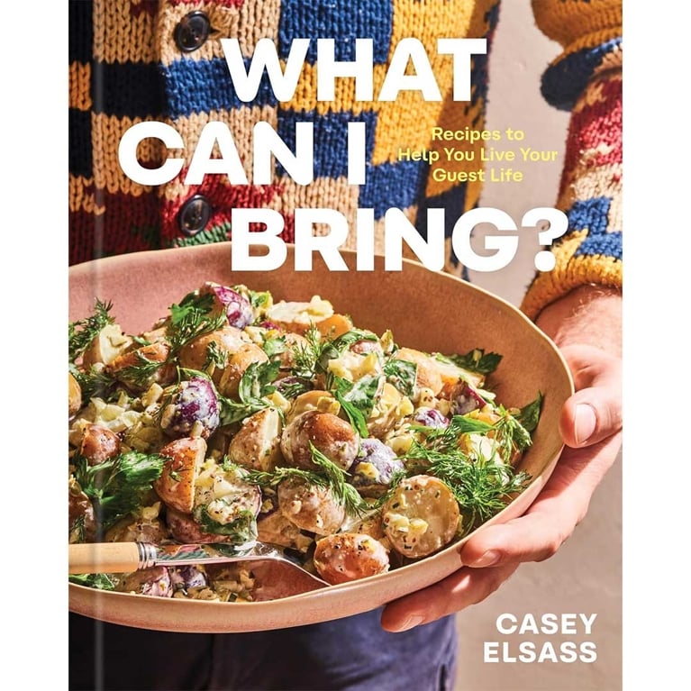 Book cover titled "What Can I Bring" with a person in a checked knit sweater holding a bowl of salad