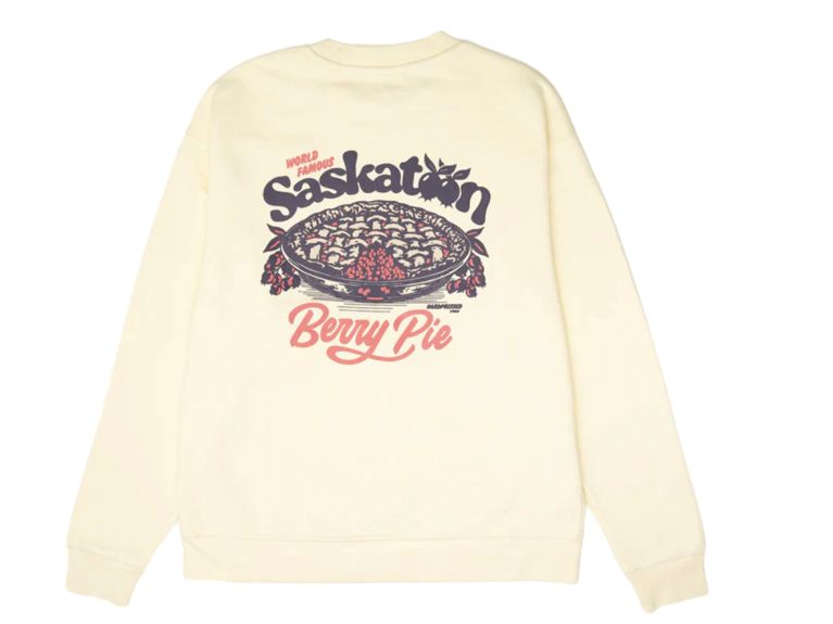 An illustrated white crewneck sweater by brand Hardpress for an article about the best made-in-Canada gift ideas.