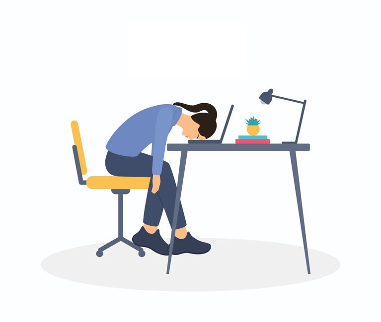 An illustration of a woman slumped over her desk looking exhausted, in a post about daylight saving time sleep tips