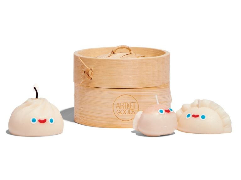 A set of dumpling candles and a steamer basket from brand Arket.