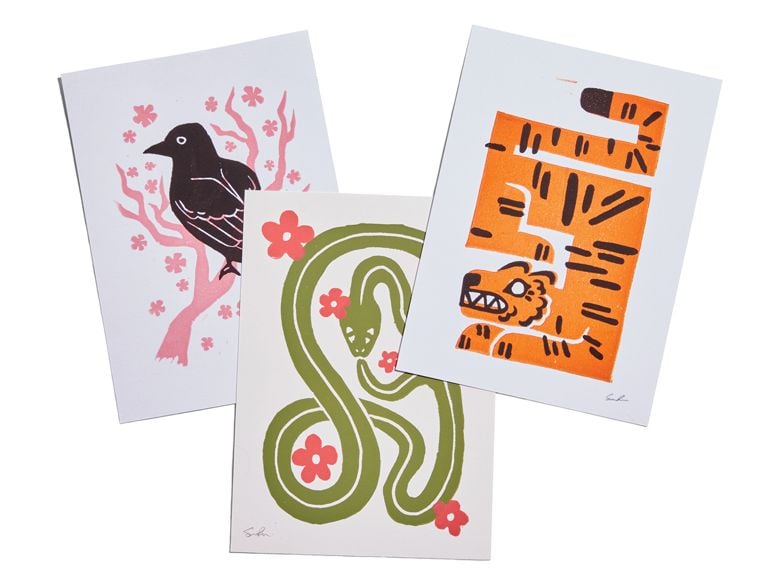 Three lino prints from artist Gena Rawson.