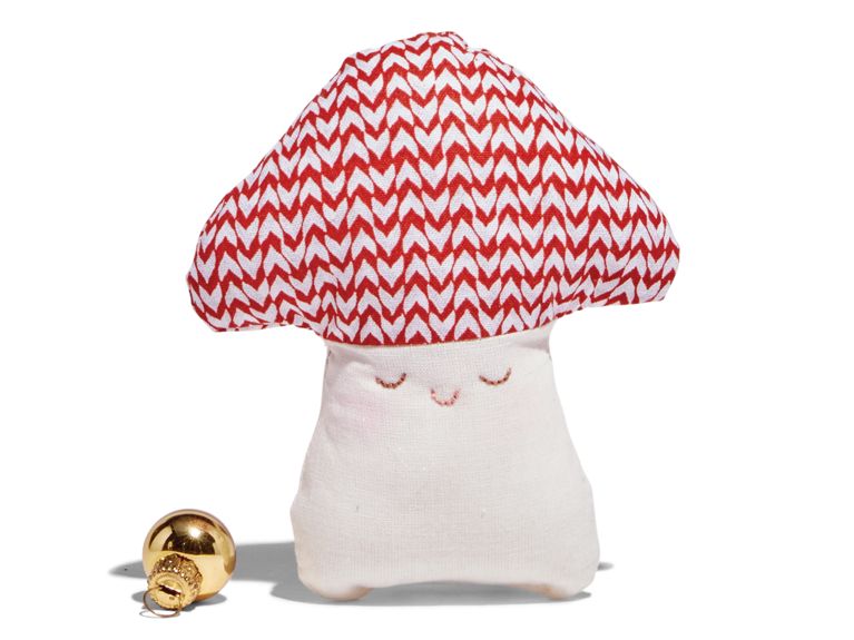 A red-topped mushroom rattle from Little Dream Toys.