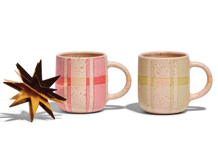 A pair of plaid-patterned mugs from ceramist Michele Macdonald.