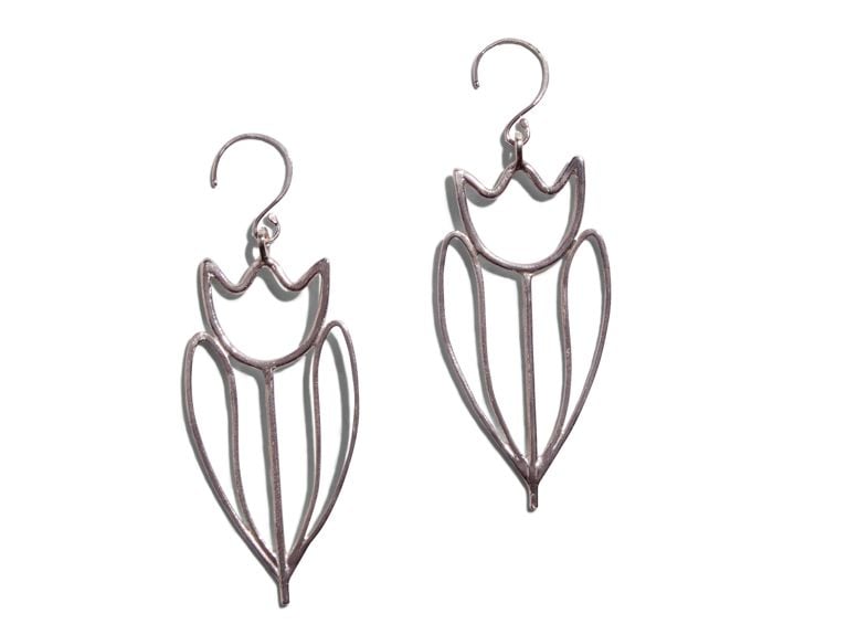 A pair of silver tulip earrings from designer Sarah Sears.