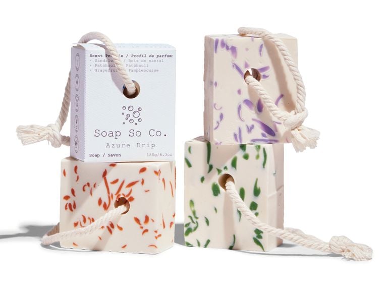 Four bars of Soap So Co. soap on a rope.