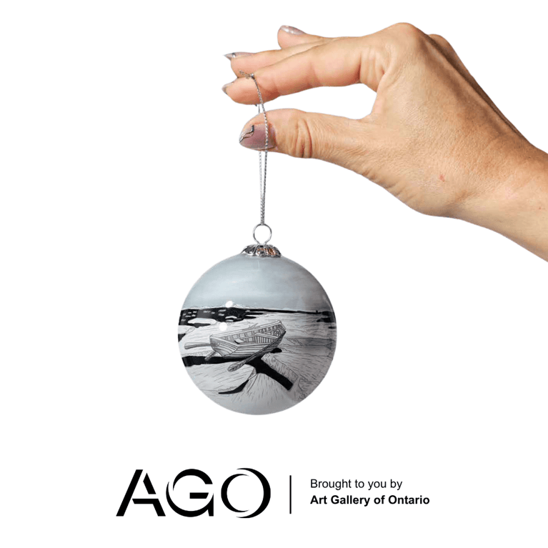Ornament displaying a frozen lake with small boat in a blend of white, grey and black.