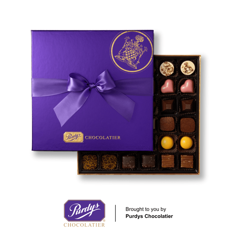 Square purple gift box filled with assorted Purdys chocolate offerings.