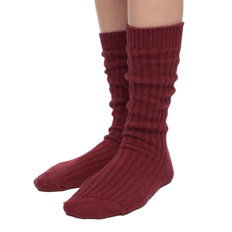 a pair of red Kotn sweater socks