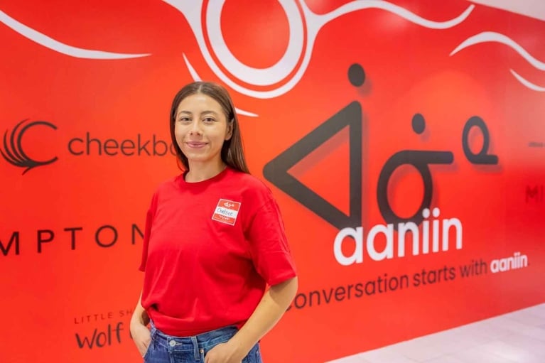 Chelsee Pettit in front of the store Aaniin
