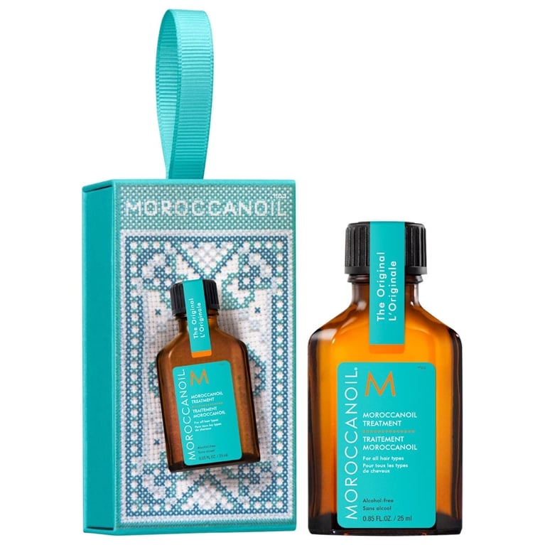 A mini Moroccanoil Mini Treatment Ornament for an article about the best stocking stuffers ideas for the holidays.