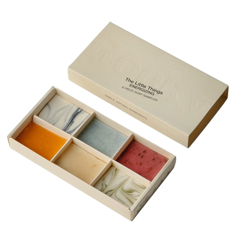 A box of Rocky The Little Things Energizing Bar Soap Sampler with mini soaps for an article about the best stocking stuffers ideas for the holidays.