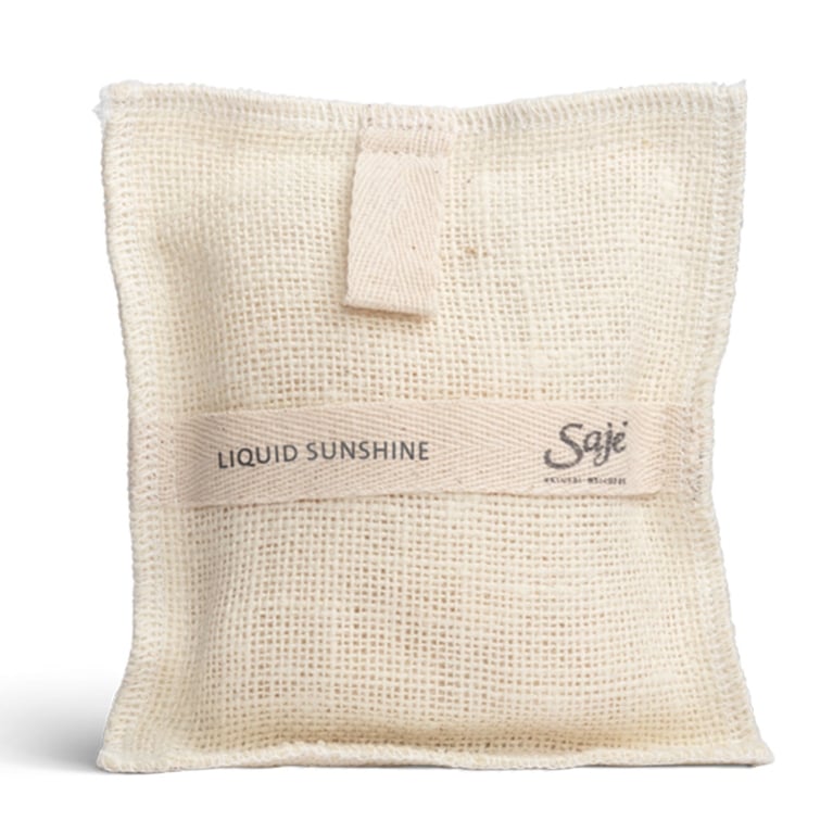 A Saje Jute & Joy Liquid Sunshine Soap-Filled Wash Pad for an article about the best stocking stuffers ideas for the holidays.