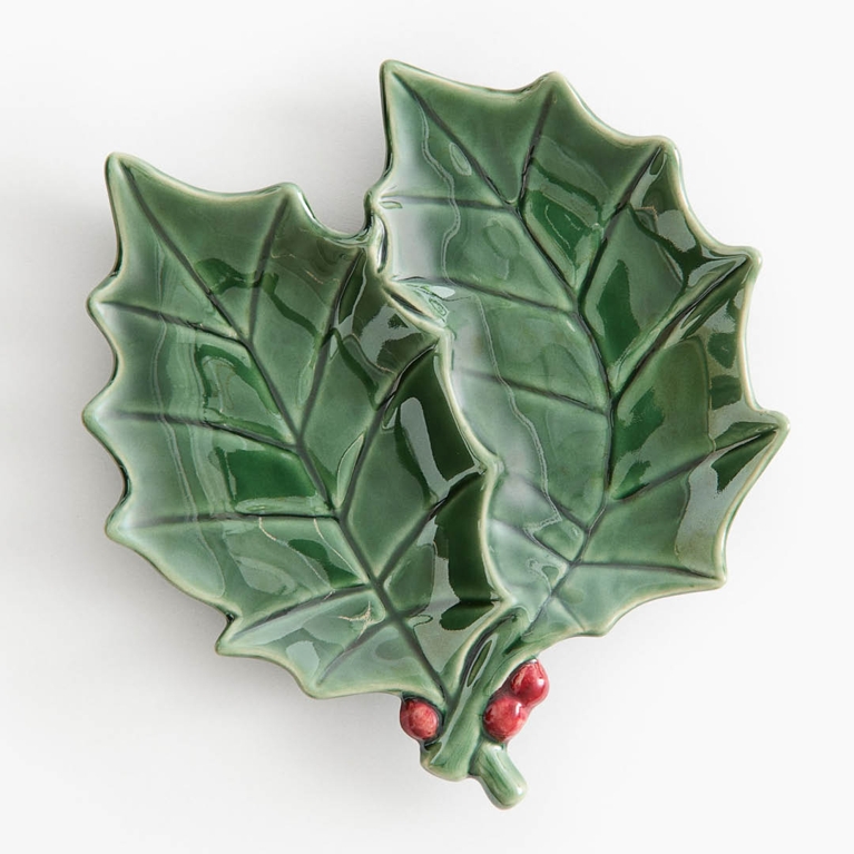 A mistletoe servinc dish for an article about the best H&M Home holiday decor pieces for 2025.