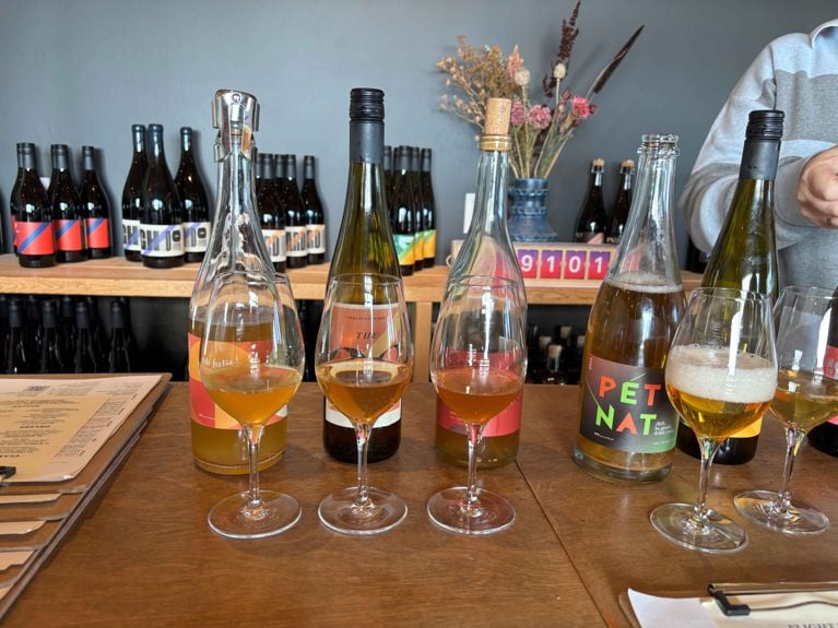 an array of wines at a tasting at Trail Estate