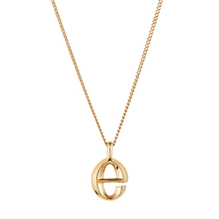 A Jenny Bird monogram pendant for an article about the best purchases our editors made in November 2025.