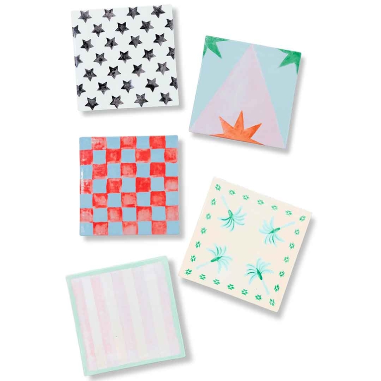 A grouping of five whimsical tile-inspired mandy's salads dessert plates.