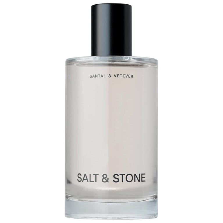 A bottle of Salt & Stone Santal & Vetiver Body Mist for an article about how to curate a cozy night in.
