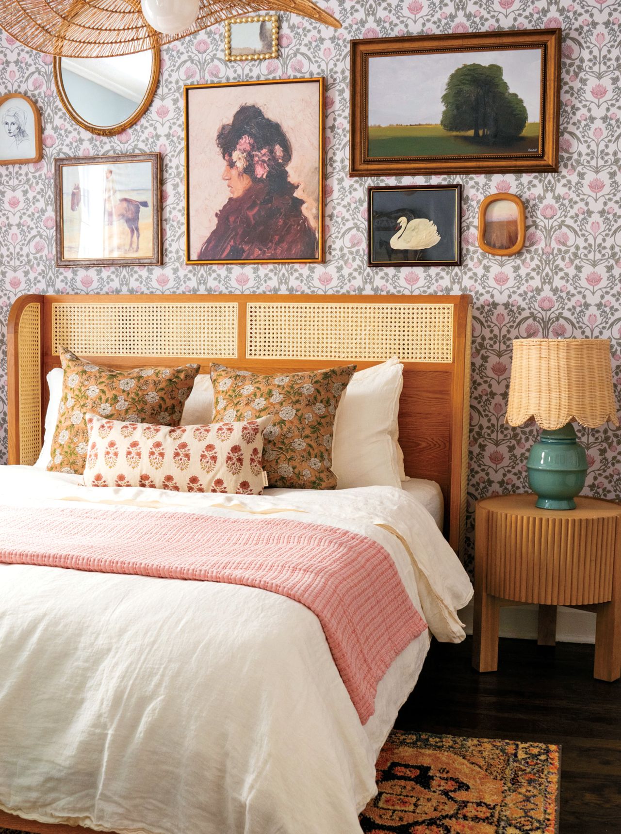 Peel-and-stick wallpaper in a floral pattern in a Coastal-inspired bedroom by decor expert Alexandra Gater for an article about easy DIY home decor projects.