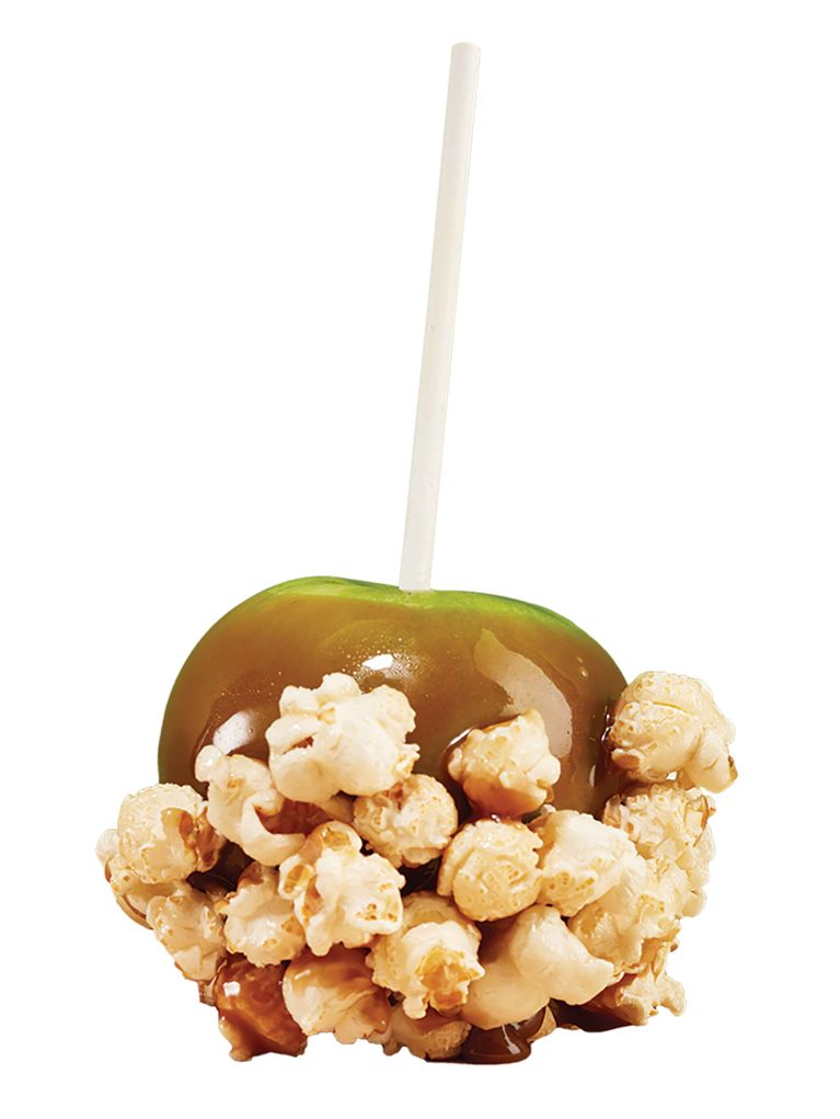 A green candy apple dipped in glossy caramel and coated on the bottom half with crunchy popcorn, served on a white stick."
