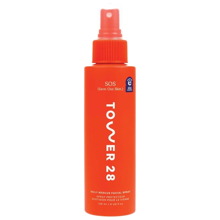 An orange bottle of Tower28 Daily Rescue Facial Spray for and article about how to wash your face according to a dermatologist.