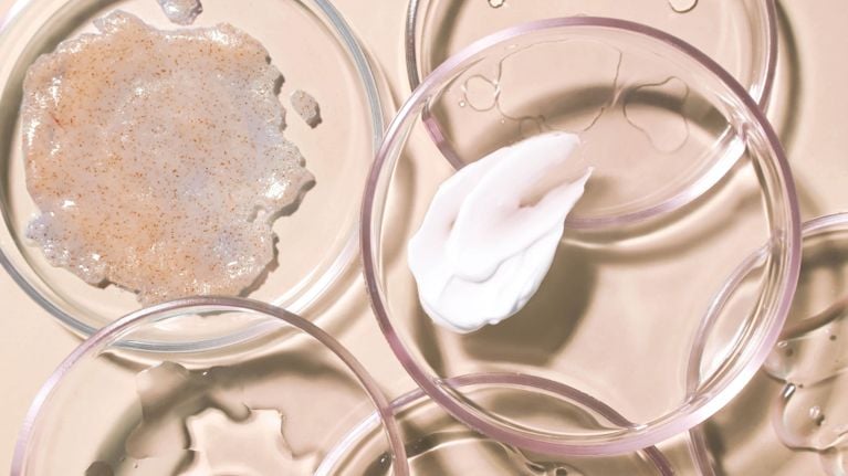 A bottle of Aestura Atobarrier365 Foaming Cleanser for and article about how to wash your face according to a dermatologist.