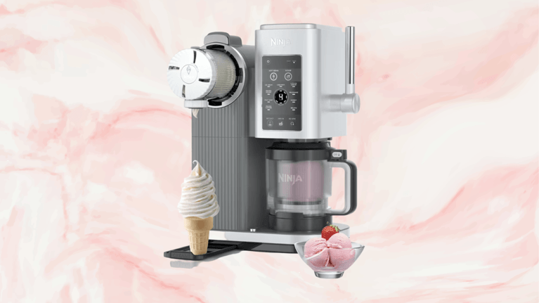 Ninja CREAMi Swirl ice cream maker on a pink marble background