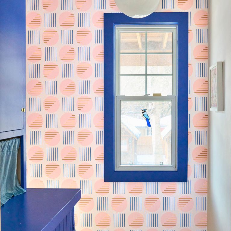 A room with Otto Studio Harvest Moon Wallpaper in Cotton Candy for an article about the best purchases our editors made in February 2026.