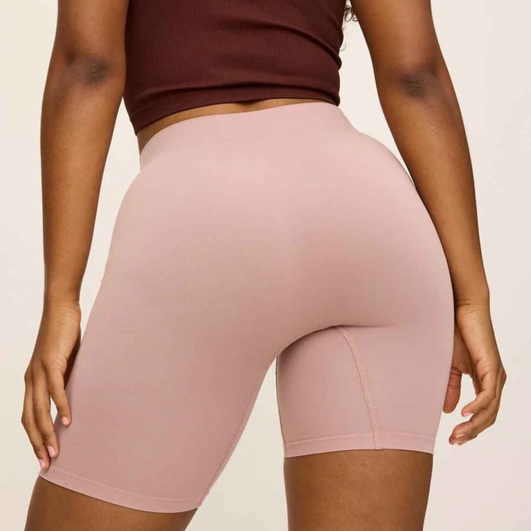 A pair of pink anti-chafe shorts from thigh society.