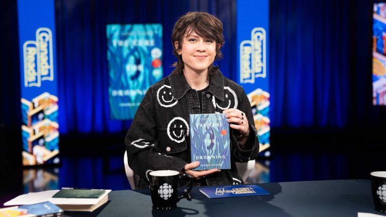 Canada Reads 2026 finalist champions Tegan Quin and Steve Glynn holding their books.