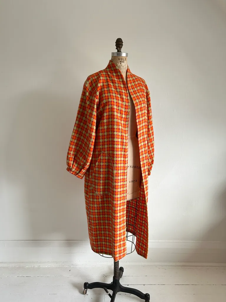 a long orange plaid coat used in a post on diana coatsworth design