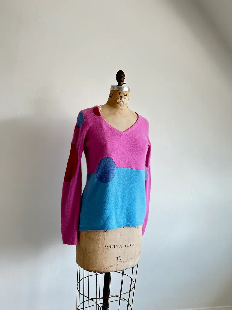 A pink and blue upcycled sweater used in a post on diana coatsworth design