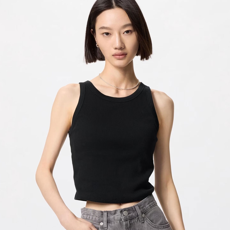 A model wearing a Uniqlo Cropped Bra Top for an article about how Drew Barrymore hates bras.