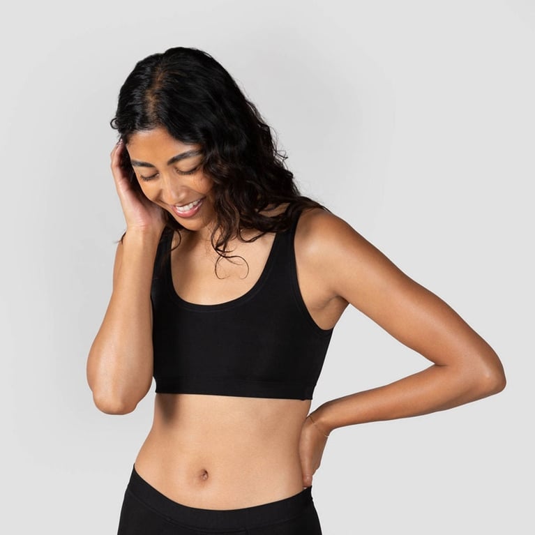 A model wearing a Hûha bralette for an article about how Drew Barrymore hates bras.