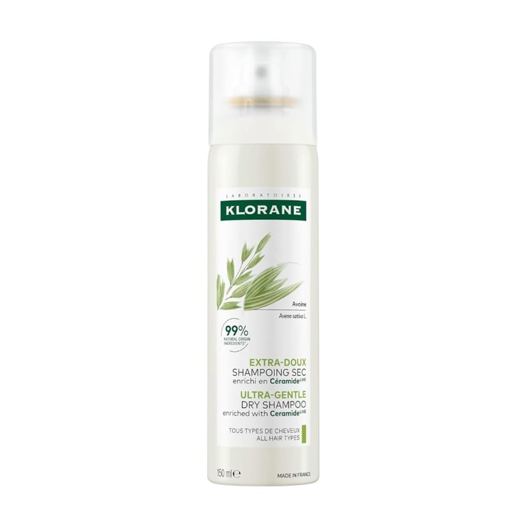 A 150ml aerosol spray bottle of the Klorane Ultra-Gentle Dry Shampoo enriched with ceramide and medicinal oats for an article about the best french drugstore beauty products you can purchase in Canada