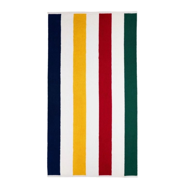 A Hudson's Bay Canadian Tire Summer Collection '26 Beach Towel Cabana with green, red, yellow, white and navy blue stripes for an article about the new collection