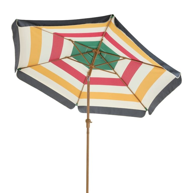 A Hudson's Bay Canadian Tire Summer Collection '26 Striped Umbrella with green, red, white, yellow and navy blue stripes for an article about the new collection