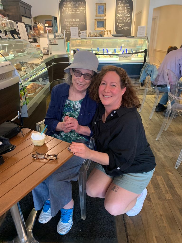 Author Marci Stepak, right, next to her mom, Eunice, in a coffee shop.