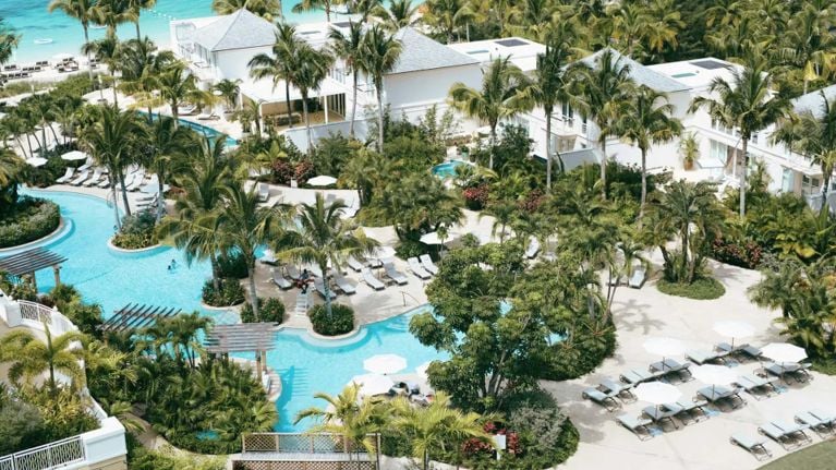 An overhead shot of the pools and beach surrounding the rosewood baha mar resort.