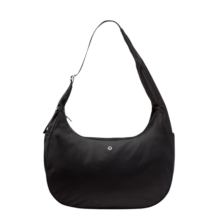 A Lululemon City Essentials Oversized Shoulder Bag (18L) in the shade Black and Silver for an article about 12 structured tote styles that do it all