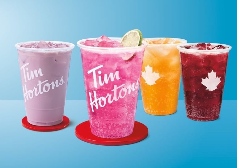 A selection of colourful iced drinks in a post on Tim Hortons protein quenchers.