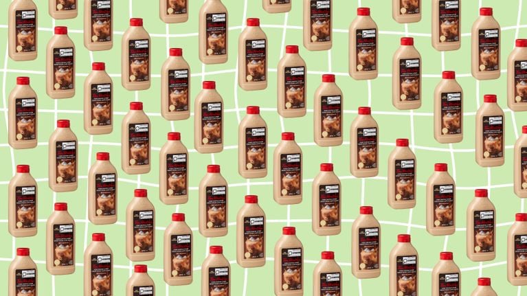 A jug of Tim Hortons Iced Coffee Syrup.