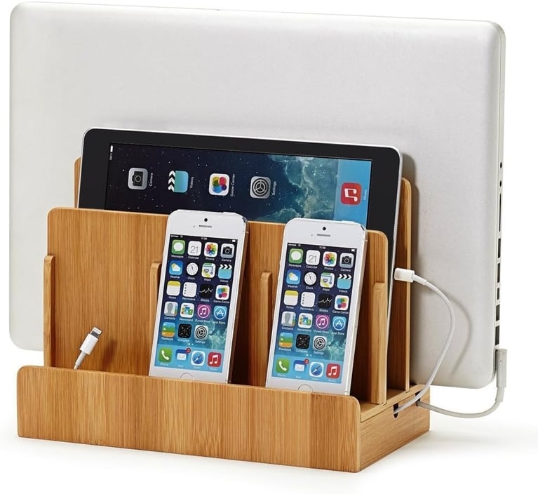 A wooden charging station used in a post on best organization tips.