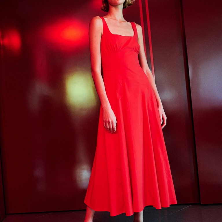 A red gathered dress from the Hailey Bieber Mango collection.