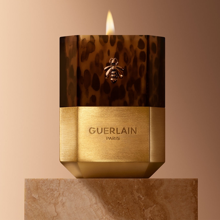 A Guerlain L’Art et La Matière Customizable Scented Candle in a leopard and gold jar for an article about the best Mother's Day gifts.