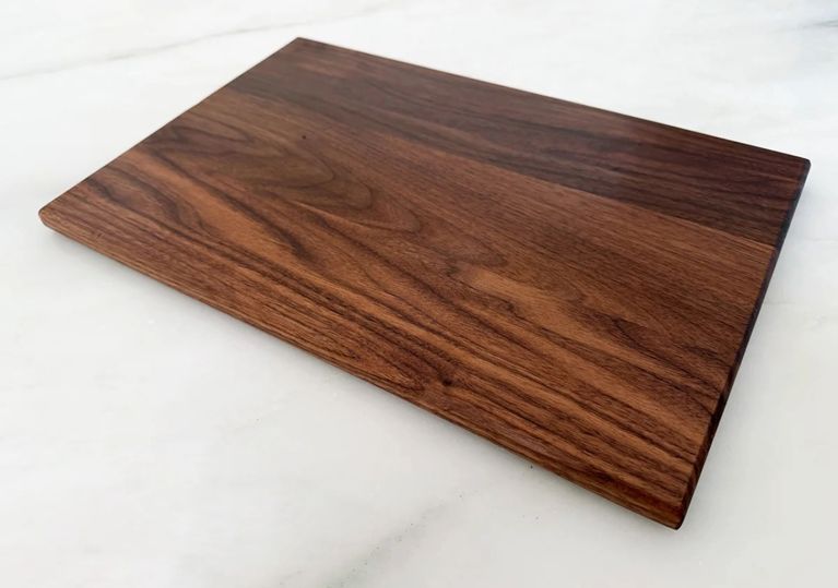Deer Park Toronto Walnut Edge Grain Cutting Board in "The Roxborough Thin" for an article about how to choose wood cutting board care 
